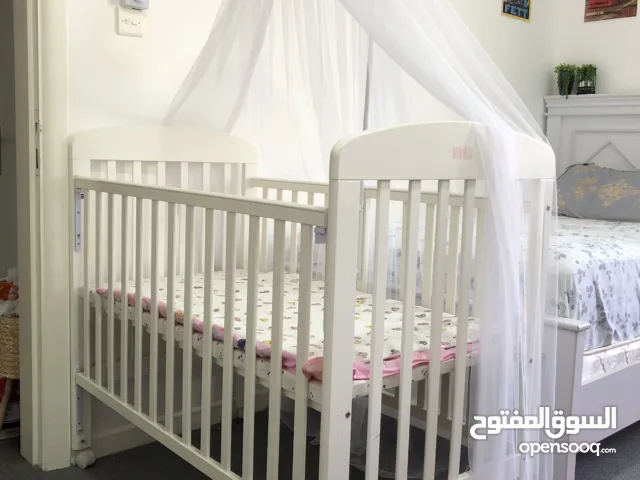 Like-New Baby Plus Wooden Baby Bed