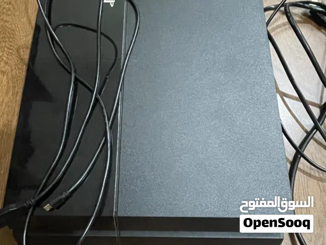 PlayStation 4 + 2 Controllers – Excellent Condition, Including all original cables