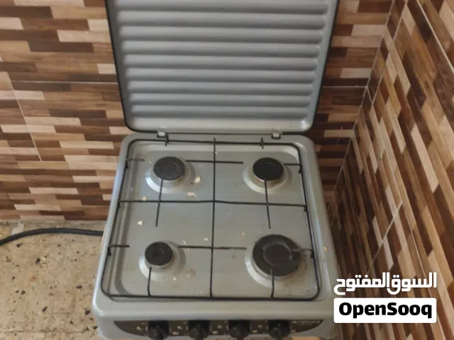 كاونتر وطباخ وميز شاشه