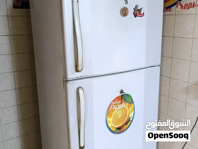 طباخ وثلاجة