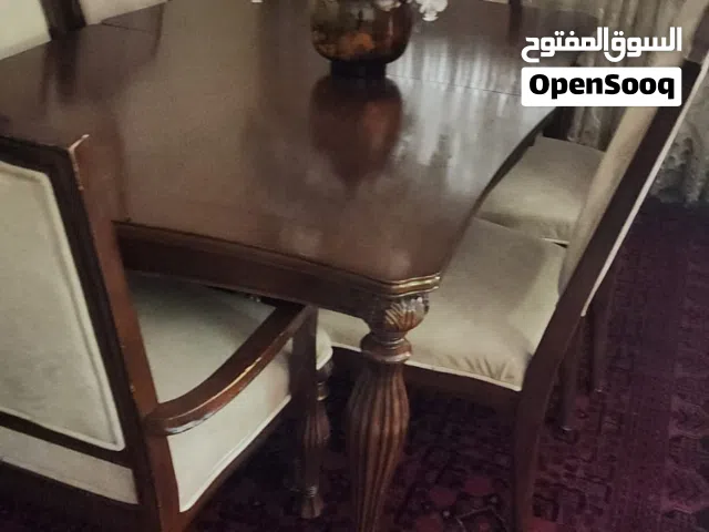 طاولة سفره مع 8كراسي من ميداس