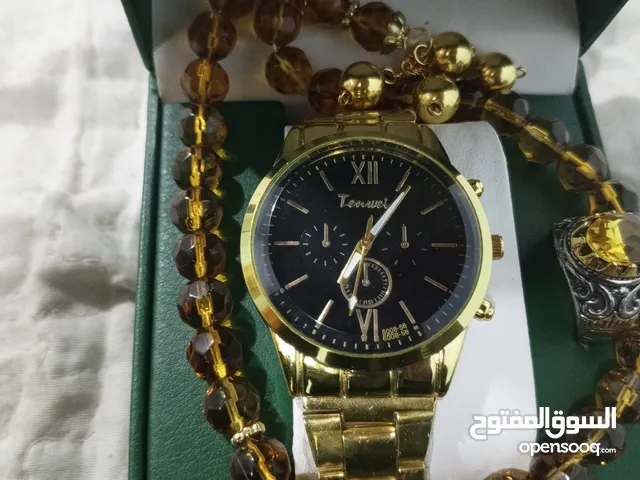 بوكس رجالي ذهبي من خاتم حجر  اصغر هيبه وساعه راقيه فخمه ومسبحه ذهبيه