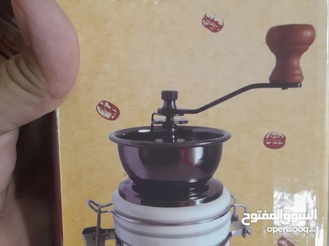 مطحنة كلاسيك قديم يدوية للقهوة والتوابل صغيرة الحجم وانيقة