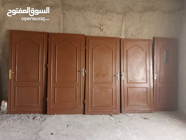 ابواب خشب عدد 7مع الحلوق تفصيل مش تجاري بحاله فوق الممتازة خشب اثقيل وانظاف خشب سويد