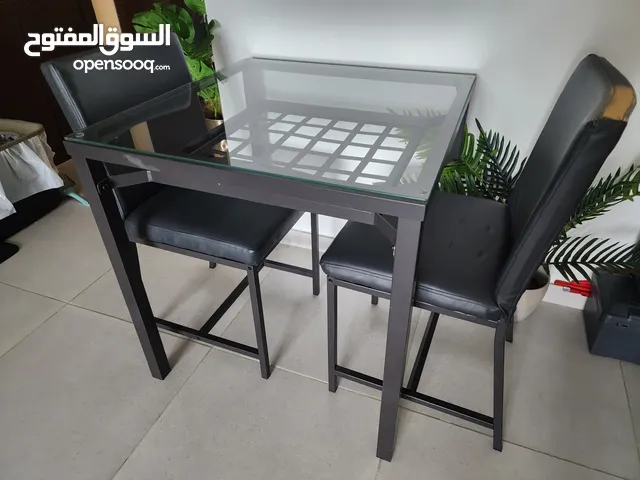 IKEA Glass top dining table with 2 chairs