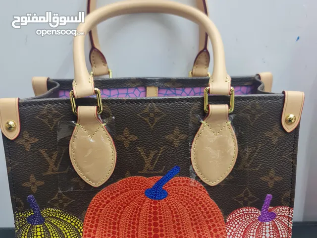 Louise Vuitton Pumpkin leather bag. New