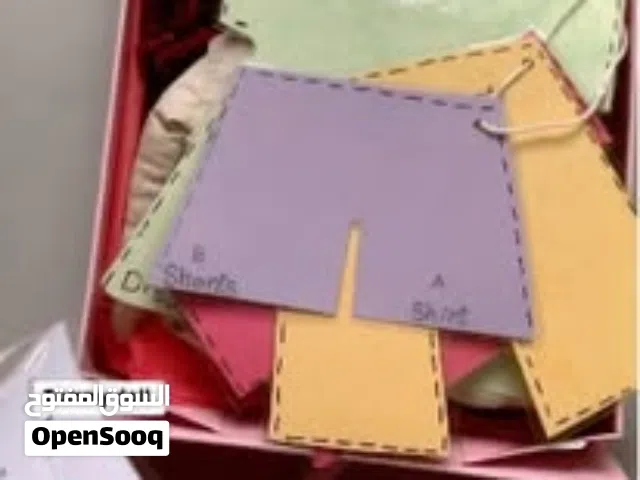 مصممة ازياء صغيره اهديها لمن تحبي بكج كامل عرض