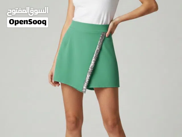 تنانير جداد غير مستعملين من اللون الاخضر والزهري