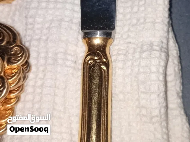 طاقم ادوات مائدة كلاسيكي  مطلي بالذهب عيار23