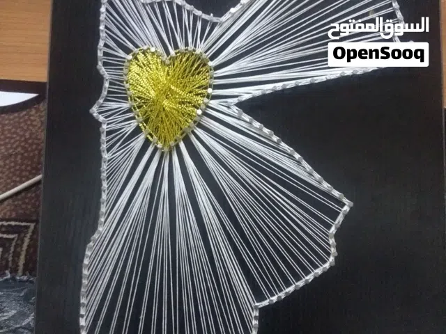 لوحات فنيه بالخيط والمسامير