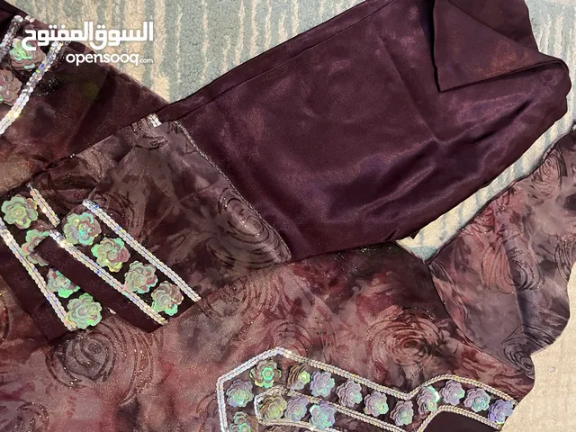 لبس عماني شغل خرز وتطريز