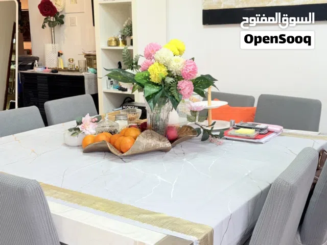 Modern dining table set with 8 chairs in excellent condition