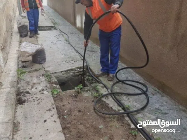 تسليك مجارى فك الانسداد تسليك غرف التفتيش بالكمبروسر سحب وشفط  المطاعم والكافيهات سحب مياه الامطار