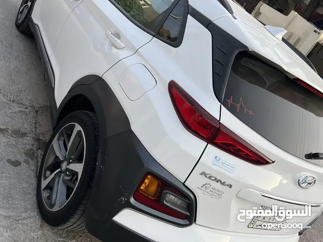 كونا 2021 محرك 1600 توربو كير Dct 7 نمر رقم بغداد ماشية 24 الف ميل قابل للزيادة