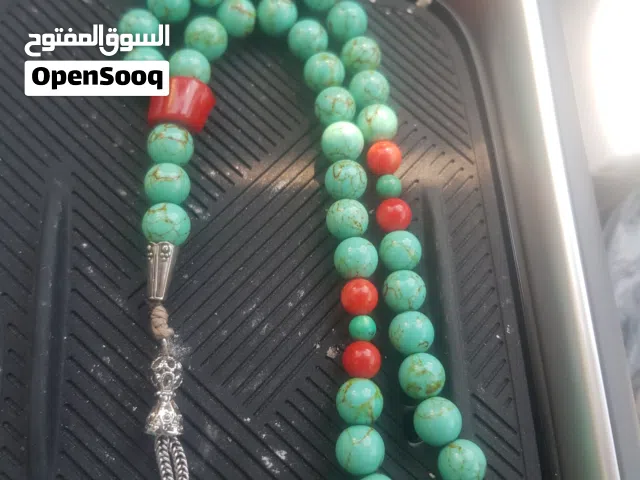 سبحه من حجر الفيروز الطبيعي لهوات النوادر والاحجار الكريمه الطبيعيه فواصل وماذنه من المرجان الاحمر