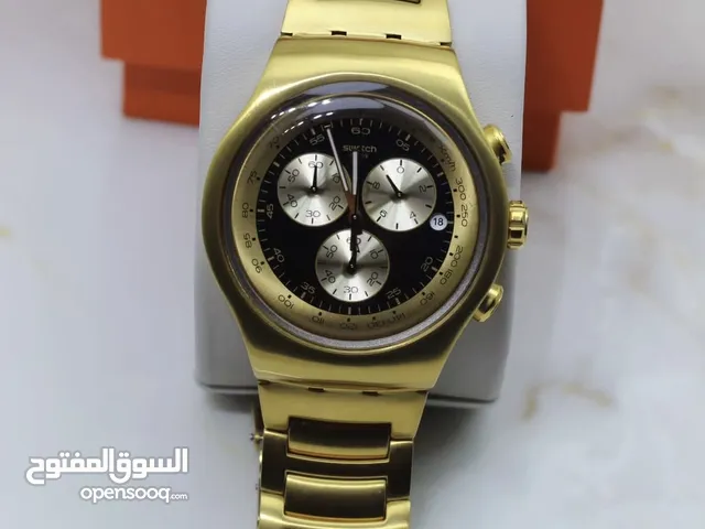 ساعة Swatch irony لون ذهبي موديل مفقود الساعة نظيفه جدا فيها نقر بسيط