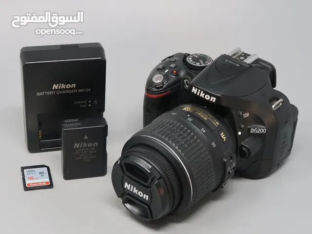 Heavy Duty Nikon D5200 DSLR barely used will all equipment for 200 only
