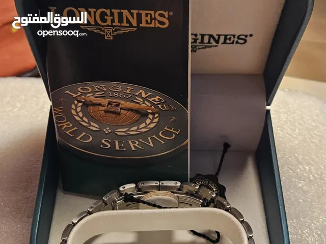 Longines Gold Wing. never been worn. brand new. box and papers