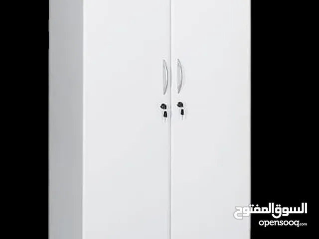 we are selling brand new 2 door cabinet white and black clr wooden 80x185 cm