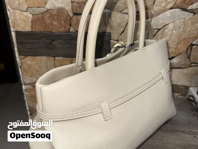شنته يد لون بيج جديدة مو مستخدمه