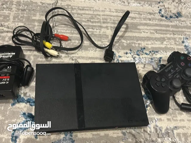 Ps2 slim with games and controller very good condition