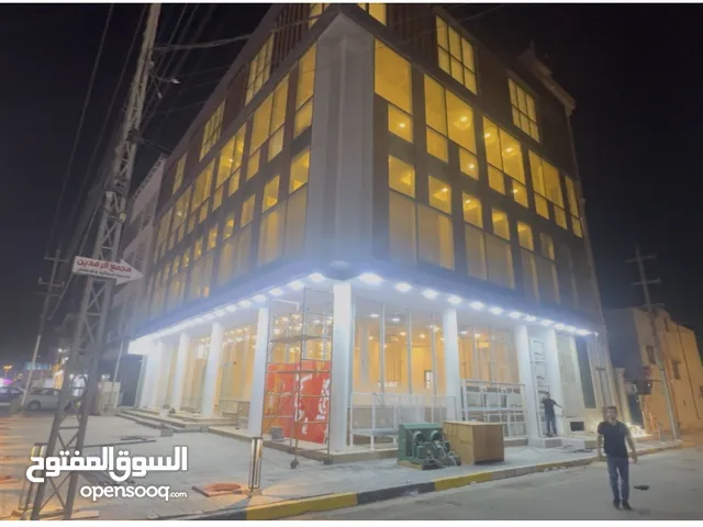 طابقين مفتوحات مساحة كل طابق 450 متر موقع تجاري مميز قرب الريان سنتر