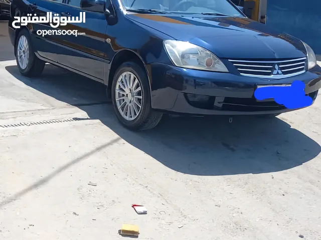 متسوبيشي لانسر 2012 لون كحلي ميتالك