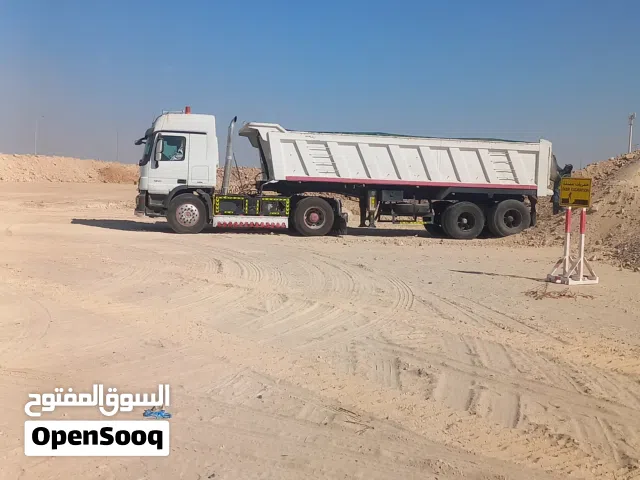 توريد كتش ومواد دفان و رمل اسود ورمل احمر زراعي ابو ظبي والعين شاحنة 3xl تتسع 35 متر مكعب