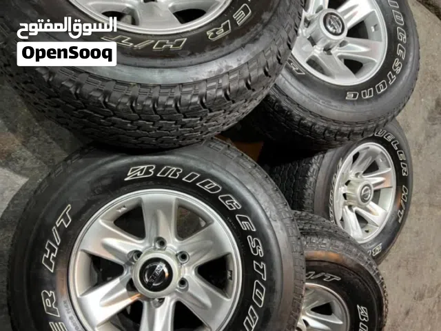 رنقات نيسان فتك مع تواير بريجستون الأصلي نظيفه موديل 2024 مقاس 275 70 16 للبيع