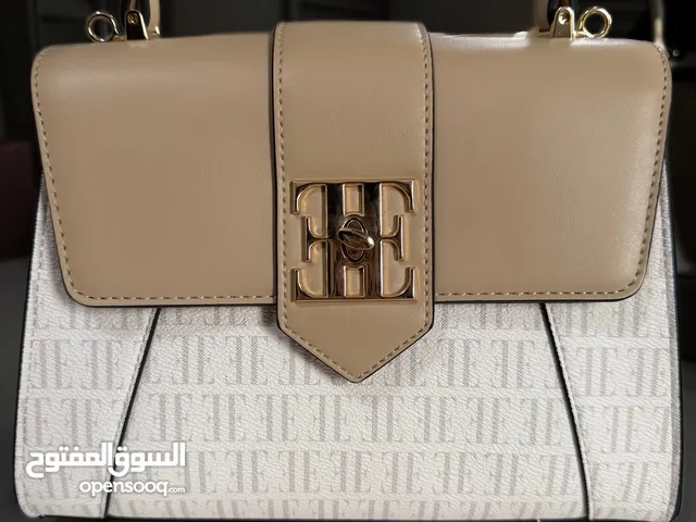 Beige and white bag (hand /crossbody bag)