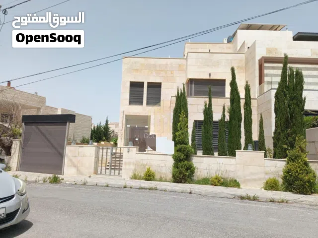 قرب مدارس المعارف في أجمل مناطق خلدا فيلا متلاصقة بتشطيبات راقية / ref 1293