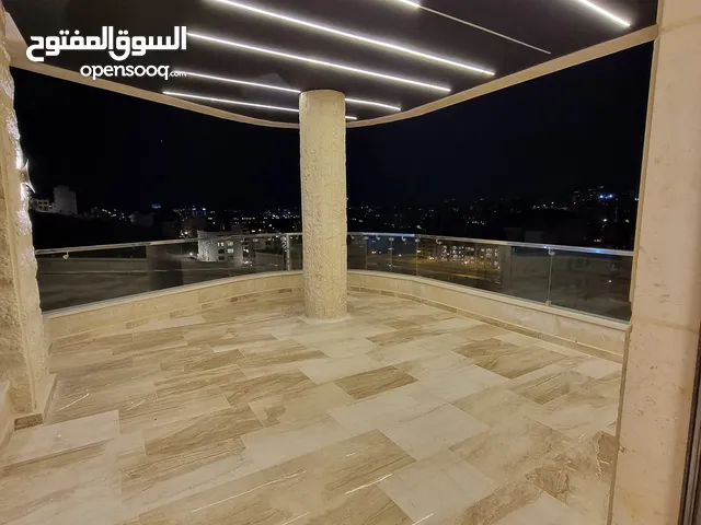 شقة ارضية 220م في ديرغبار حجار النوابلسة باطلالة بانوراما على عبدون بتشطيب فندقي