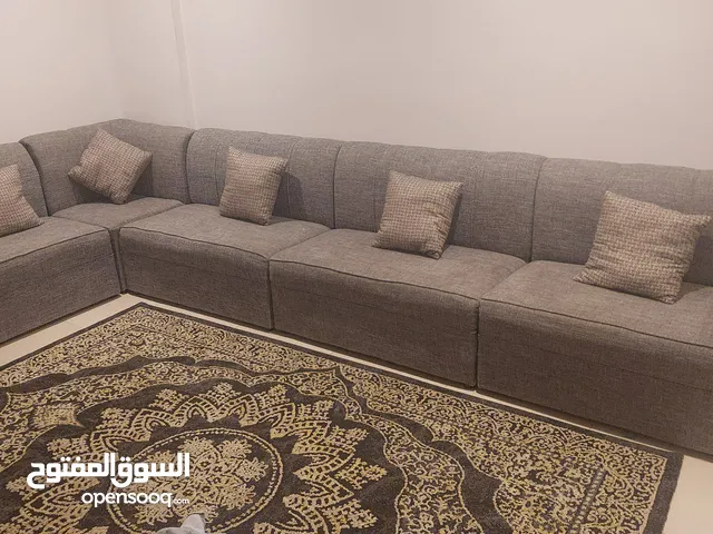 5 seater sofa with carpet