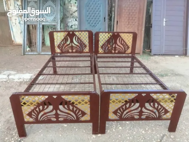 أسِرَّة حديد فخمة بتصميم عصري وأنيق