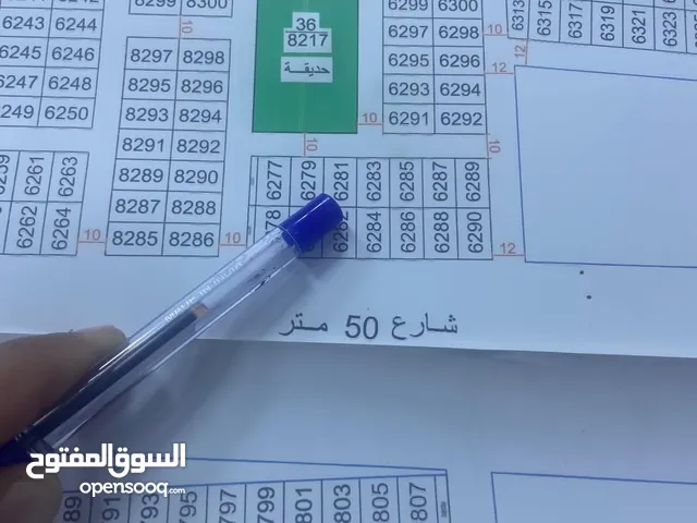 نص قطعه للبيع مقابل حديقه مساحه 125 متر