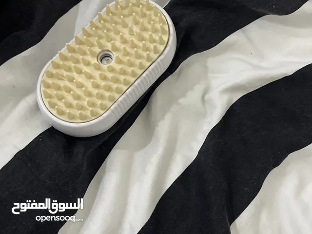 مشط خطط بخاري يزيل شعر قطط