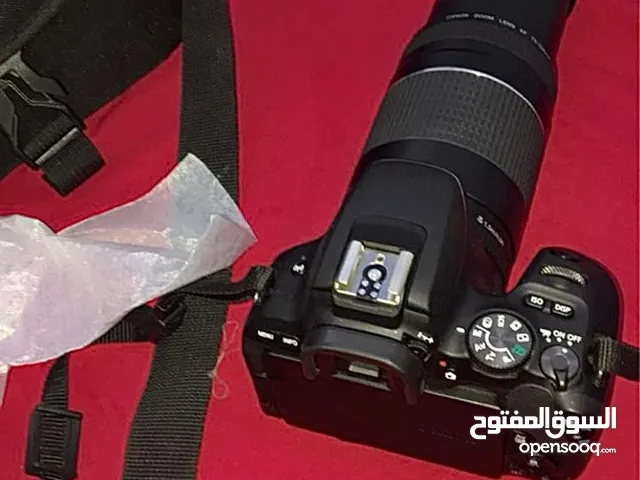 كاميره كانون 200D شبه جديده مع اغراضها عدستين و ستاند جديد