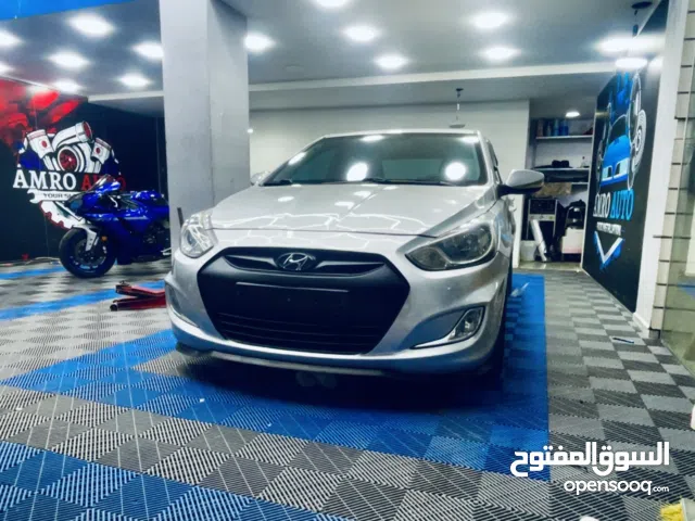 اكسنت 2014  4 غيار  1،4 بحالة ممتازة  اصل كوري مقاعد جلد