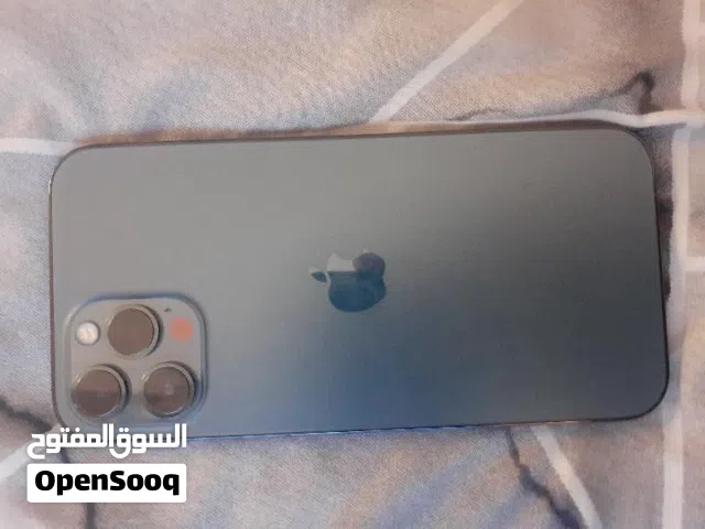iPhone 12 بروماكس لون كحلي 128 جيجا بايت بطارية 92% ما فيه أي مشاكل كل قطعة اصلية مش مغير إشي
