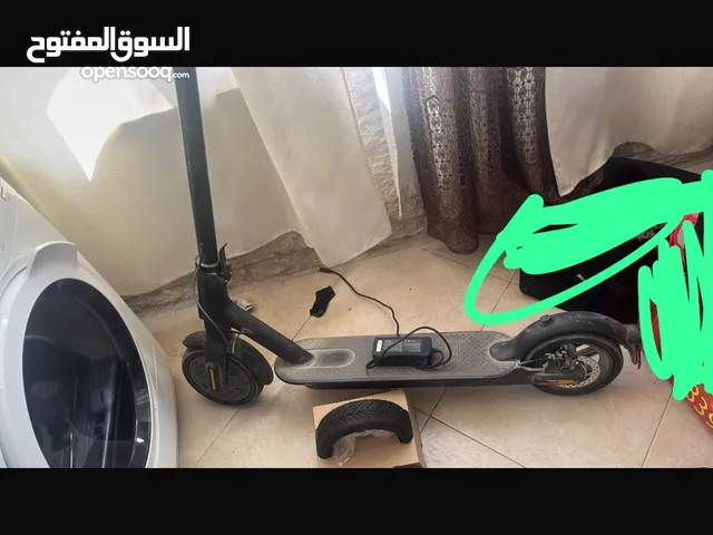 سكوتر شاومي بدون ضو خلفي مع شاحن وعجل زيادة  على 1500
