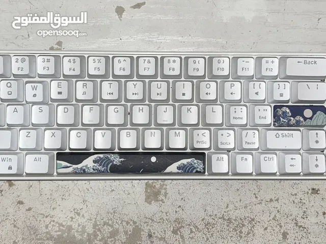 Keypads of a keyboard and red switches with pcb board