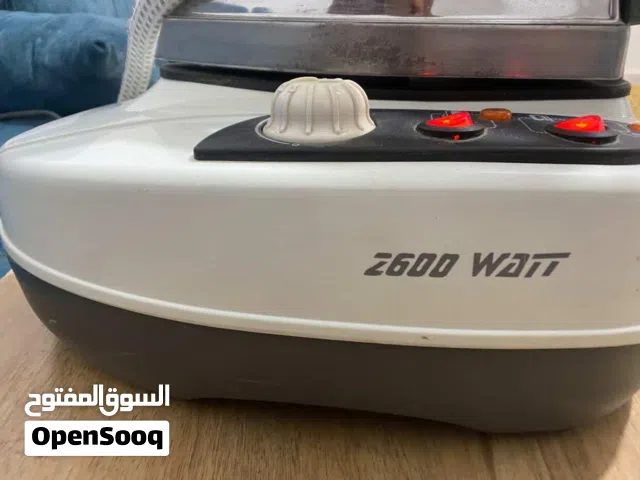 مكوة ملابس بخارية