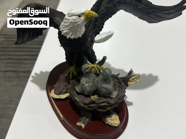 تحف وز كندي وصقر أمريكي ( نحت بدوي) مختوم