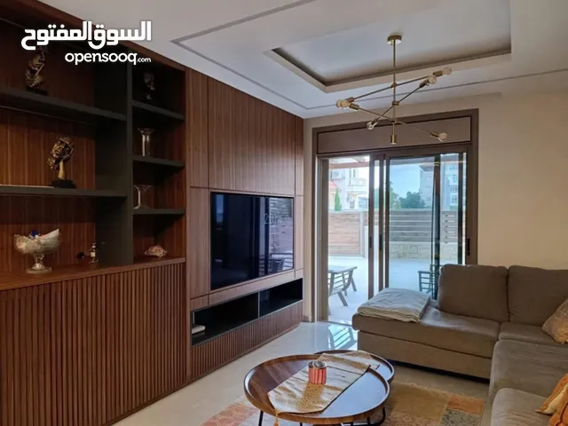 شقه للبيع مع حديقه في المصيون خلف البنك العربي