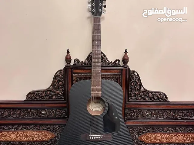Fender CD60 V2 BLK Carbon Fiber wrap acoustic guitar - 200 JDs