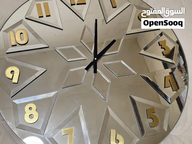 ساعه زجاجيه
