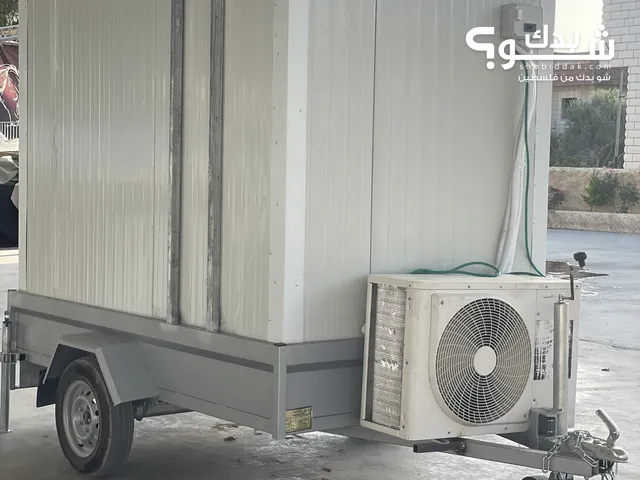 ثلاجة متنقلة على السيارة