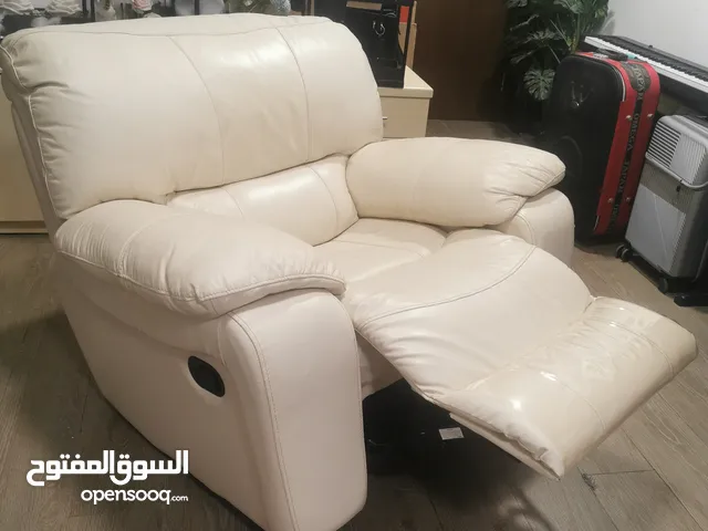 Very clean leather swinging recliner for sale, same as new!