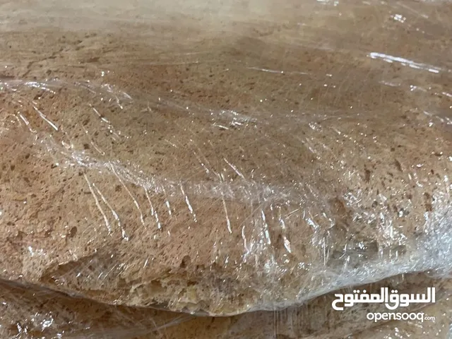 خبز بر طازج  يخبز بوميا  بأيدي عمانية سعر الكيس ريال