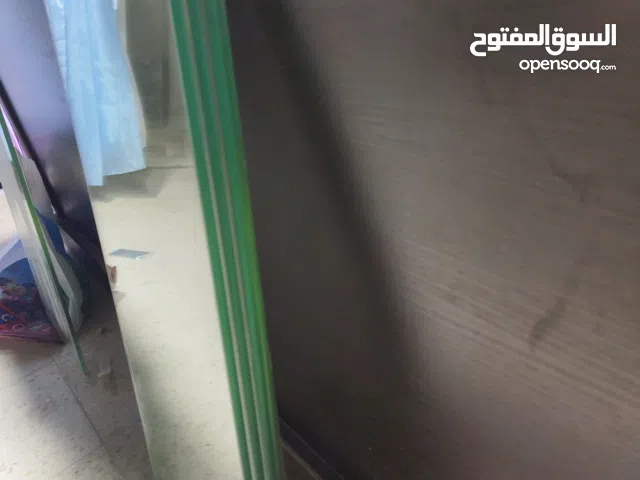 رفوف زجاج محلات تجارية ارفف زجاج قزاز ديكور